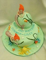 Two Mermaids on a Cake
