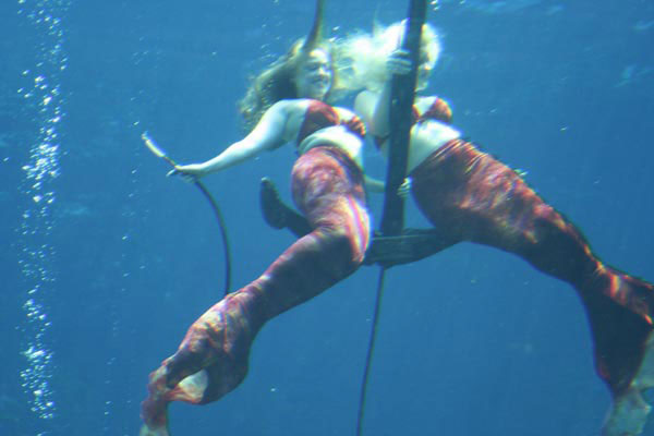 Mermaids Hang on Anchor - Mermaid Model Under Water