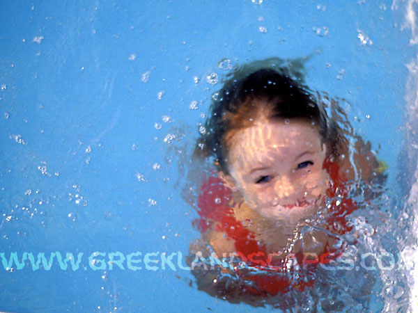 Young Mermaid Emerges - Mermaid Model Under Water