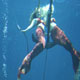 Mermaids Hang on Anchor