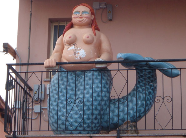 Fat Mermaid on Balcony