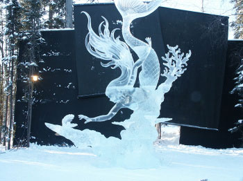 Ice mermaid looking down - Mermaid Statue