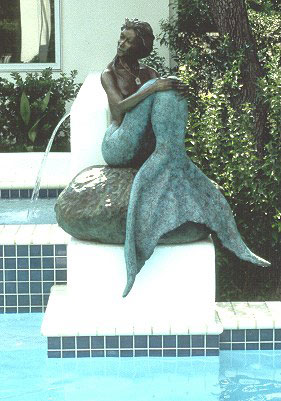 Mermaid Statue in Pool