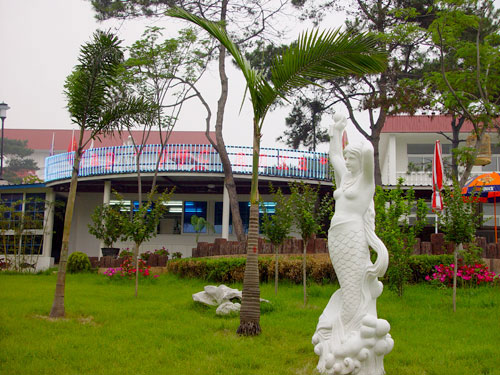 Mermaid and palm trees - Mermaid Statue