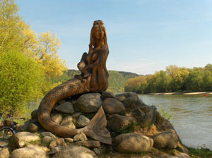 Wooden Mermaid on Rocks