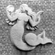 Mermaid on Brick Wall