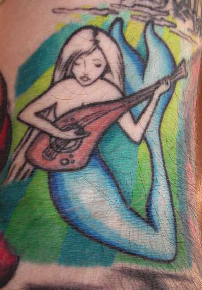 Mermaid Tattoo and Guitar - Mermaid Tatoo